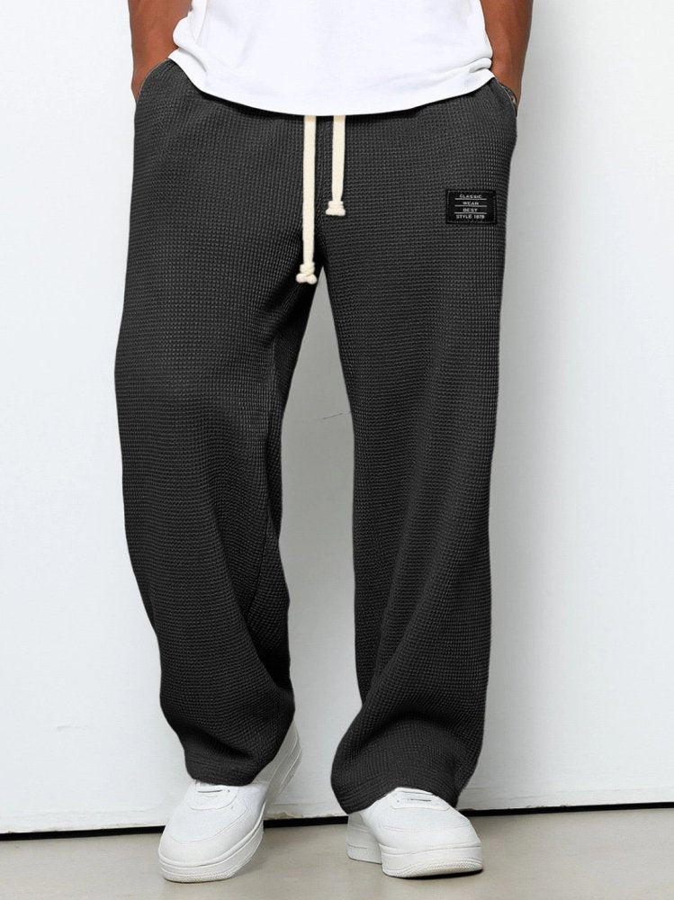 Arndt - Spodnie męskie szerokie | Regulowany sznurek w pasie, luźne nogawki | Styl casual na co dzień
